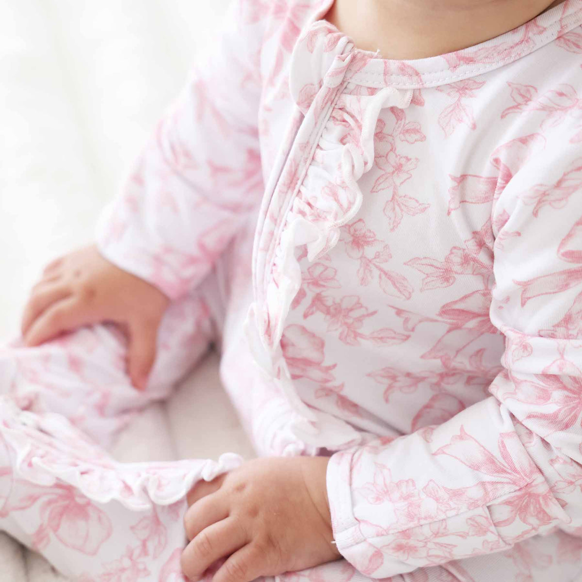 Tutina footie bambina in bamboo-spandex rosa toile con zip e grip