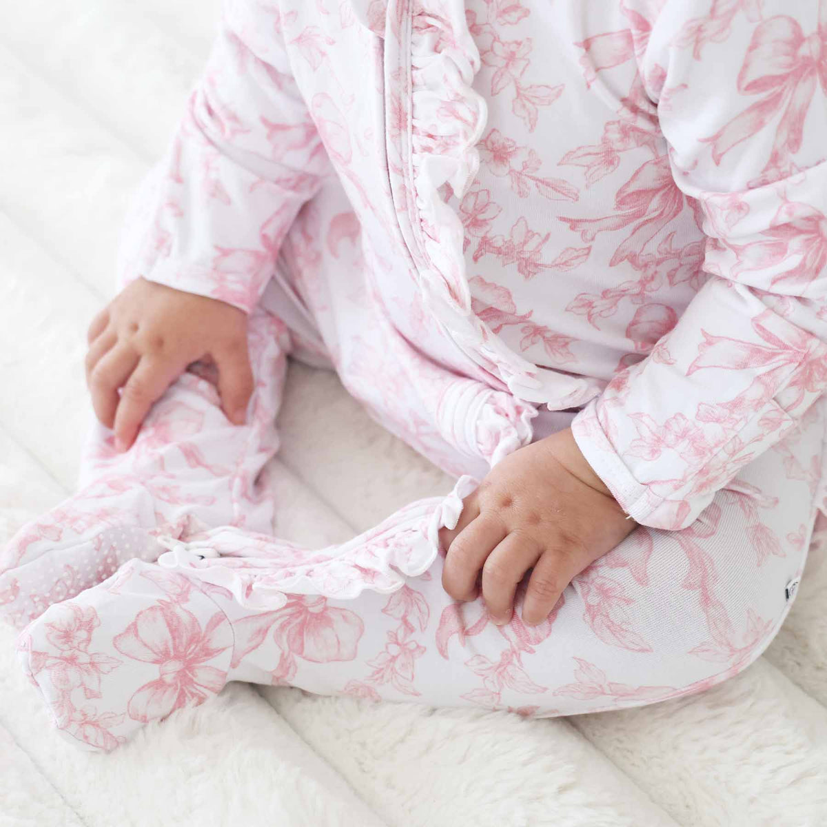 Tutina footie bambina in bamboo-spandex rosa toile con zip e grip