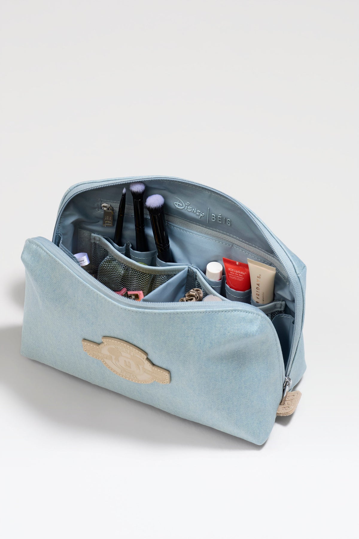La trousse à maquillage moyenne Disney en bleu jean