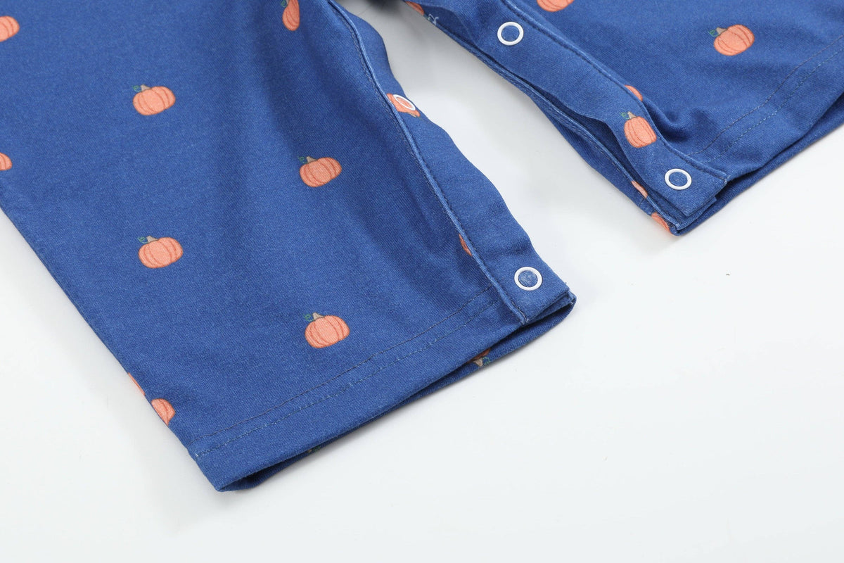 Salopette bimbo in maglia di cotone blu con zucca ricamata
