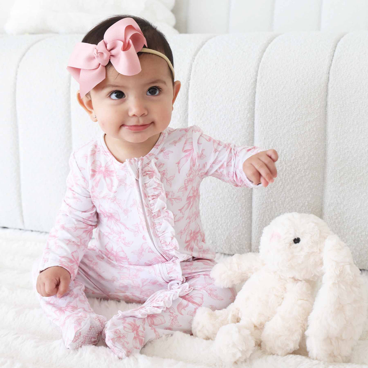 Tutina footie bambina in bamboo-spandex rosa toile con zip e grip