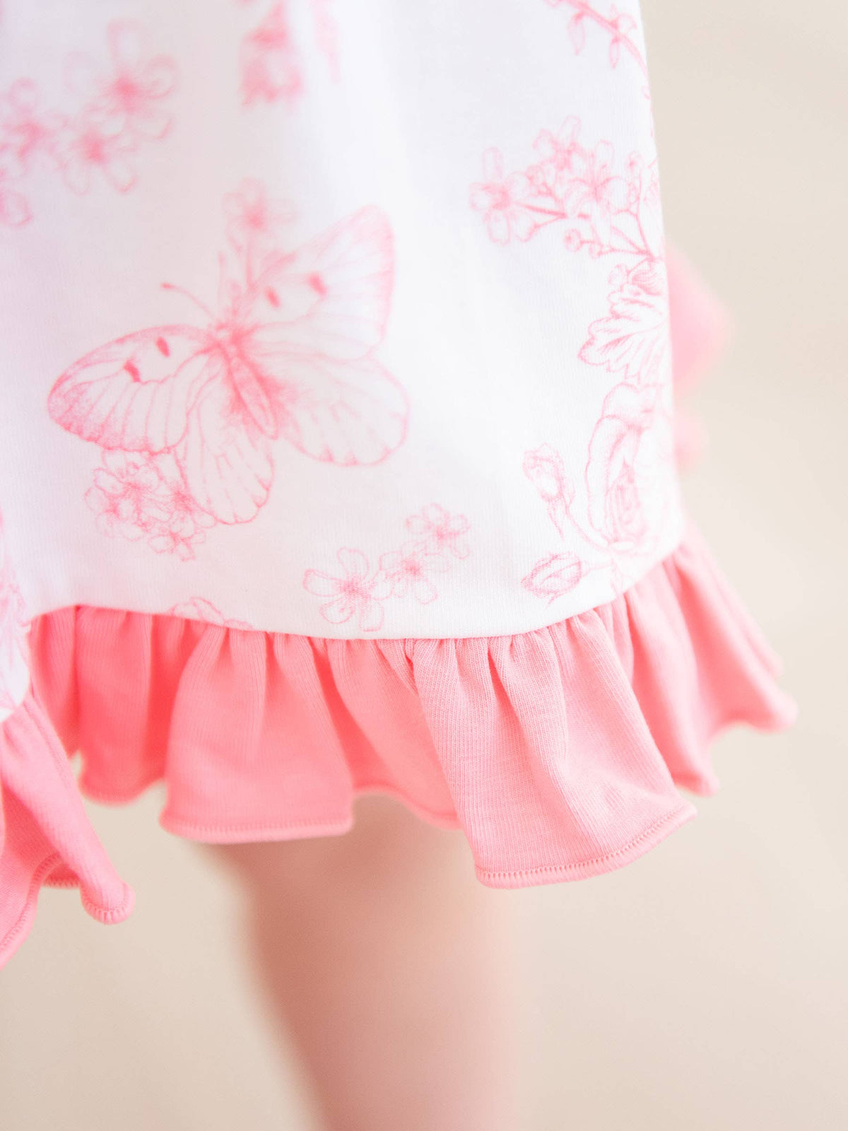 Completo top con volant e bloomers in maglia cotone-spandex con stampa farfalle toile