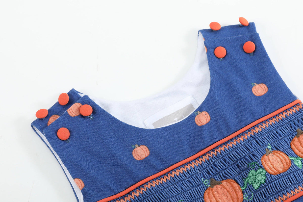 Salopette bimbo in maglia di cotone blu con zucca ricamata