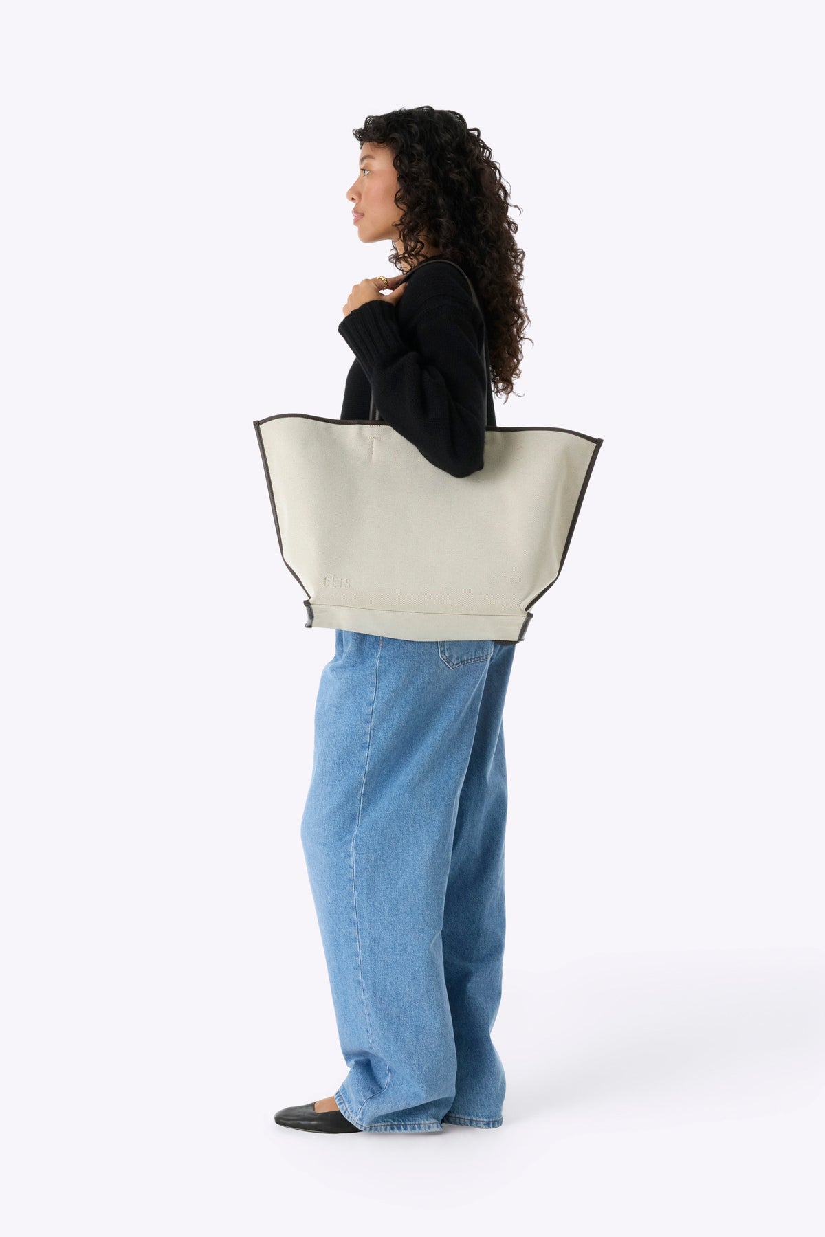 Die Canvas- und Ledertasche in Espresso