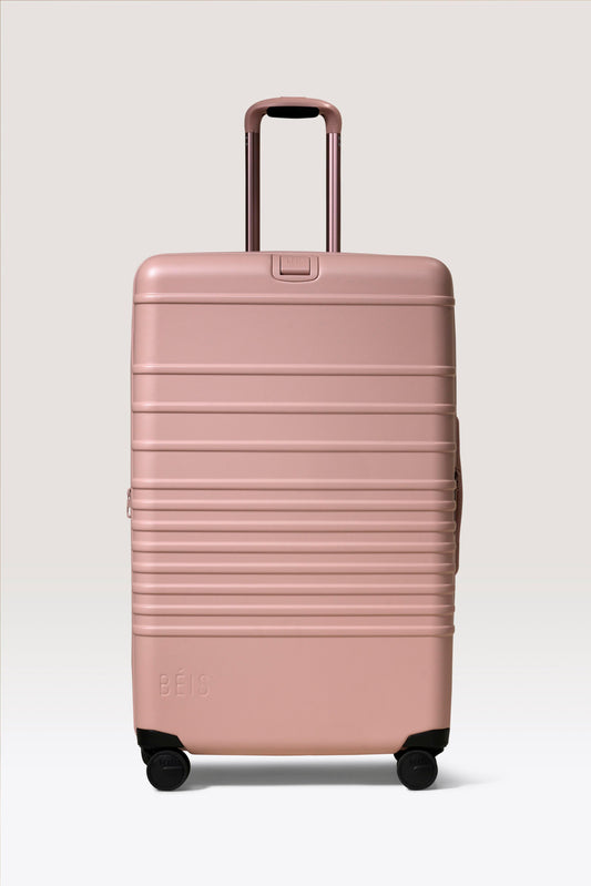 La valise à roulettes Large Check-In en coloris Atlas Pink