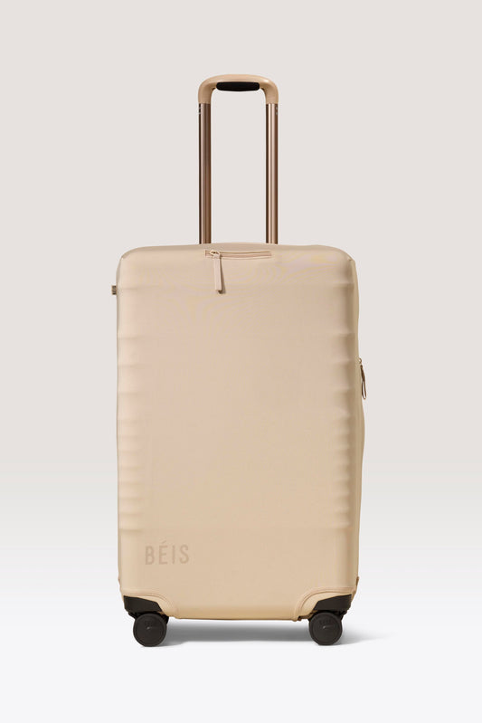 Housse pour valise de taille moyenne en beige