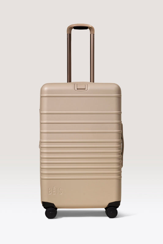 La valise à roulettes Medium Check-In beige