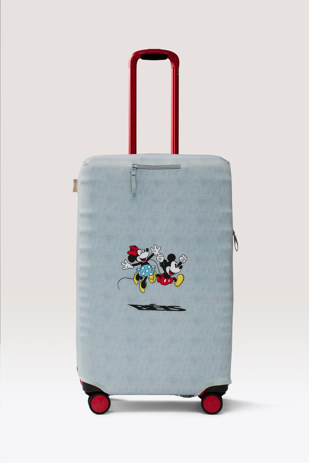 La funda para maleta mediana facturada Disney en vaquero azul