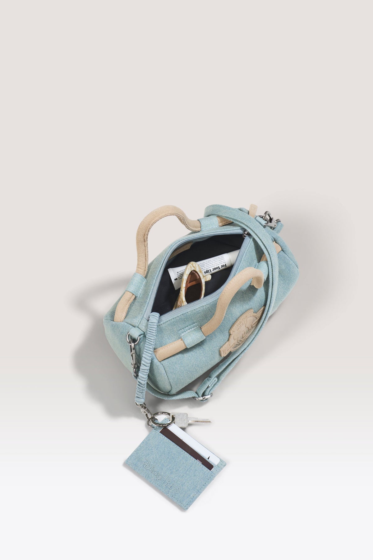 La bolsa de viaje pequeña Disney en vaquero azul