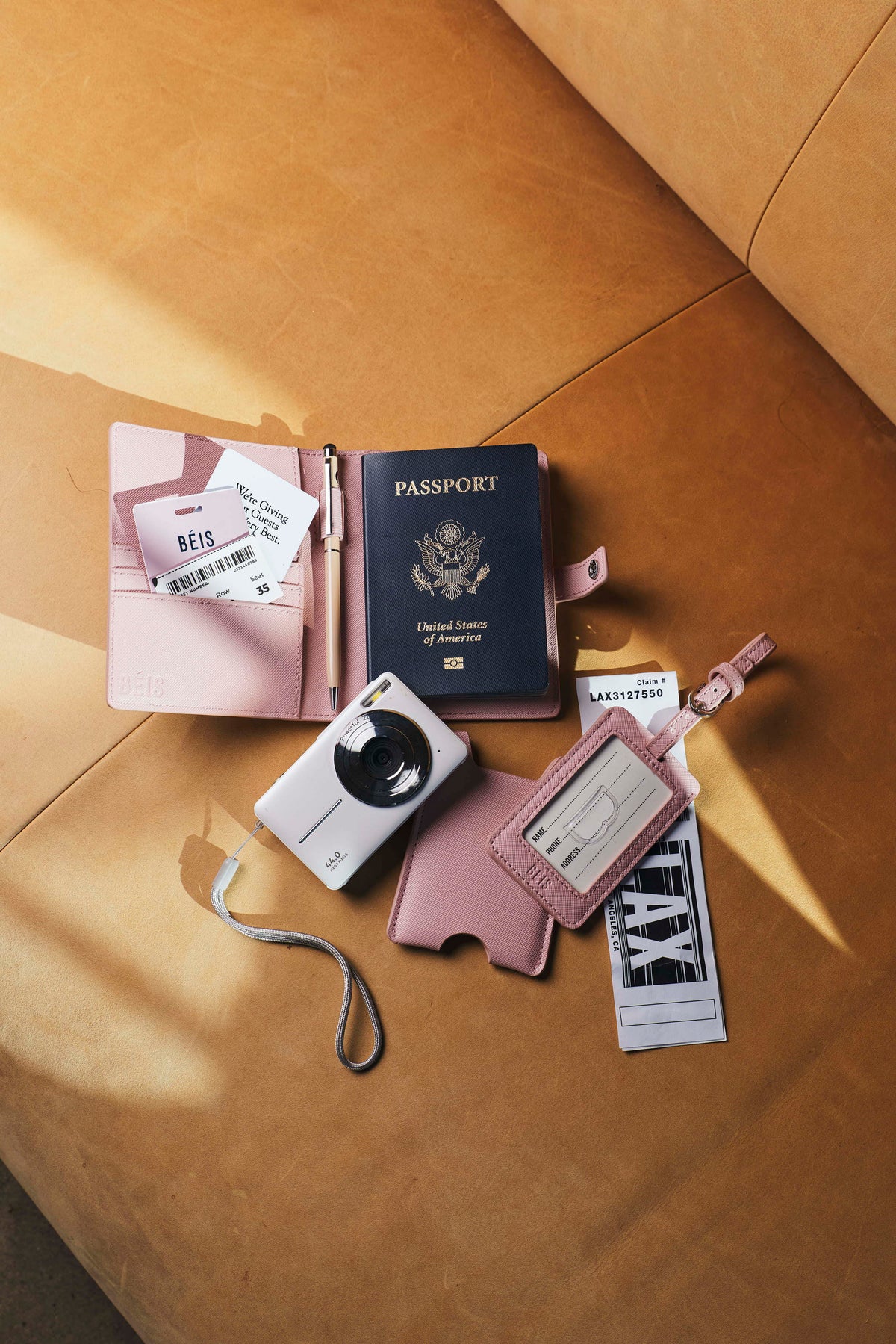 Ensemble porte-passeport et étiquette de bagage en rose Atlas