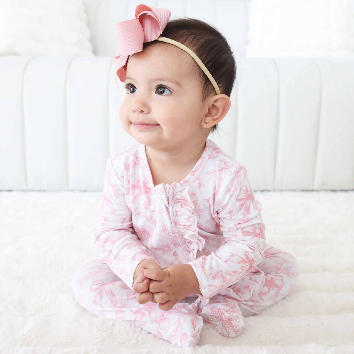 Tutina footie bambina in bamboo-spandex rosa toile con zip e grip